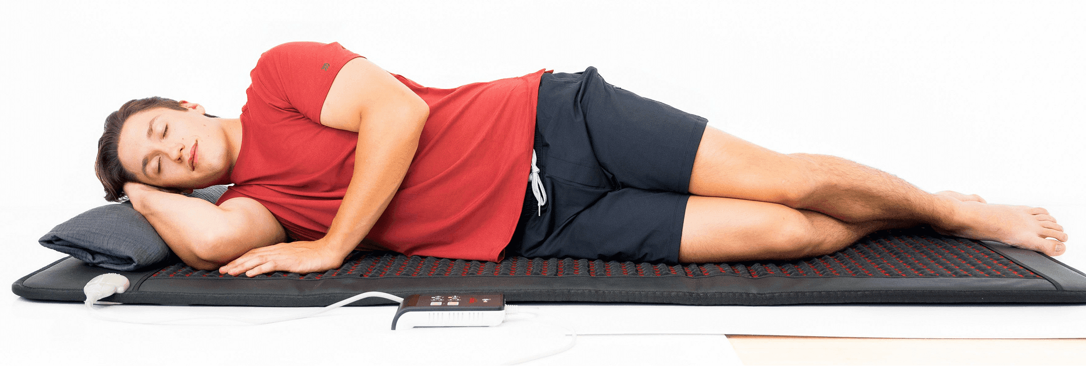 Person relaxing on the Hooga PEMF mat